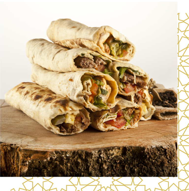 Image of stacked delicious beef and chicken shawarma wraps